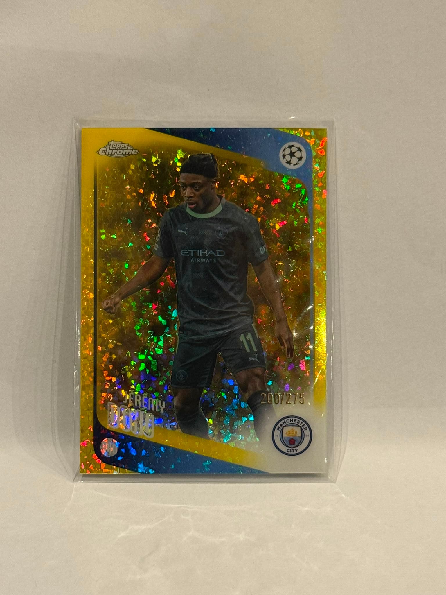 2025-26 Topps Chrome UEFA Champions League Gold Speckle Refractor #47 Jeremy Doku /275