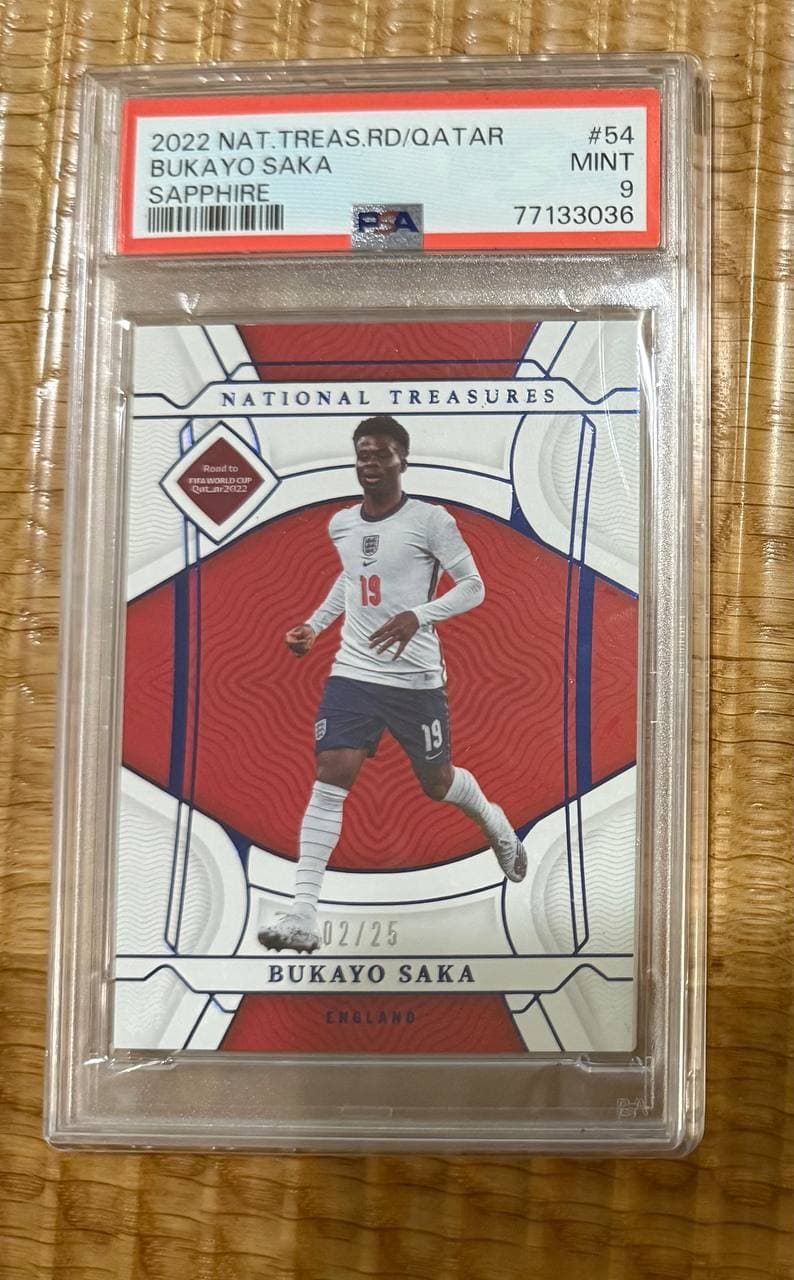 2022 Panini National Treasures Road to Qatar #54 Bukayo Saka Sapphire /25